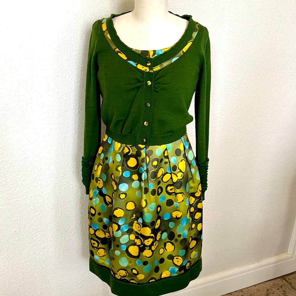 Contemporary multi colored dress with matching short sweater.